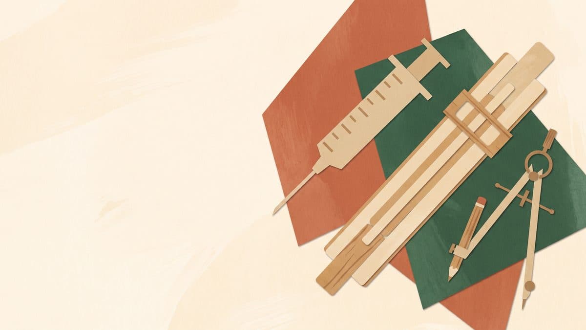Paper-cut illustration of a syringe laid on geometric paper shapes beside a slide rule and a drawing compass