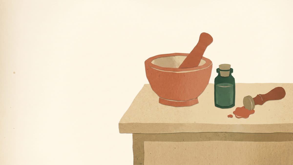 Paper-cut illustration of a mortar and pestle, a sealed vial and a wax seal stamp on a counter